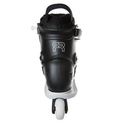 A black inline skate boot with a white base and a white wheel, featuring a prominent white stylized 'R' logo on the side.