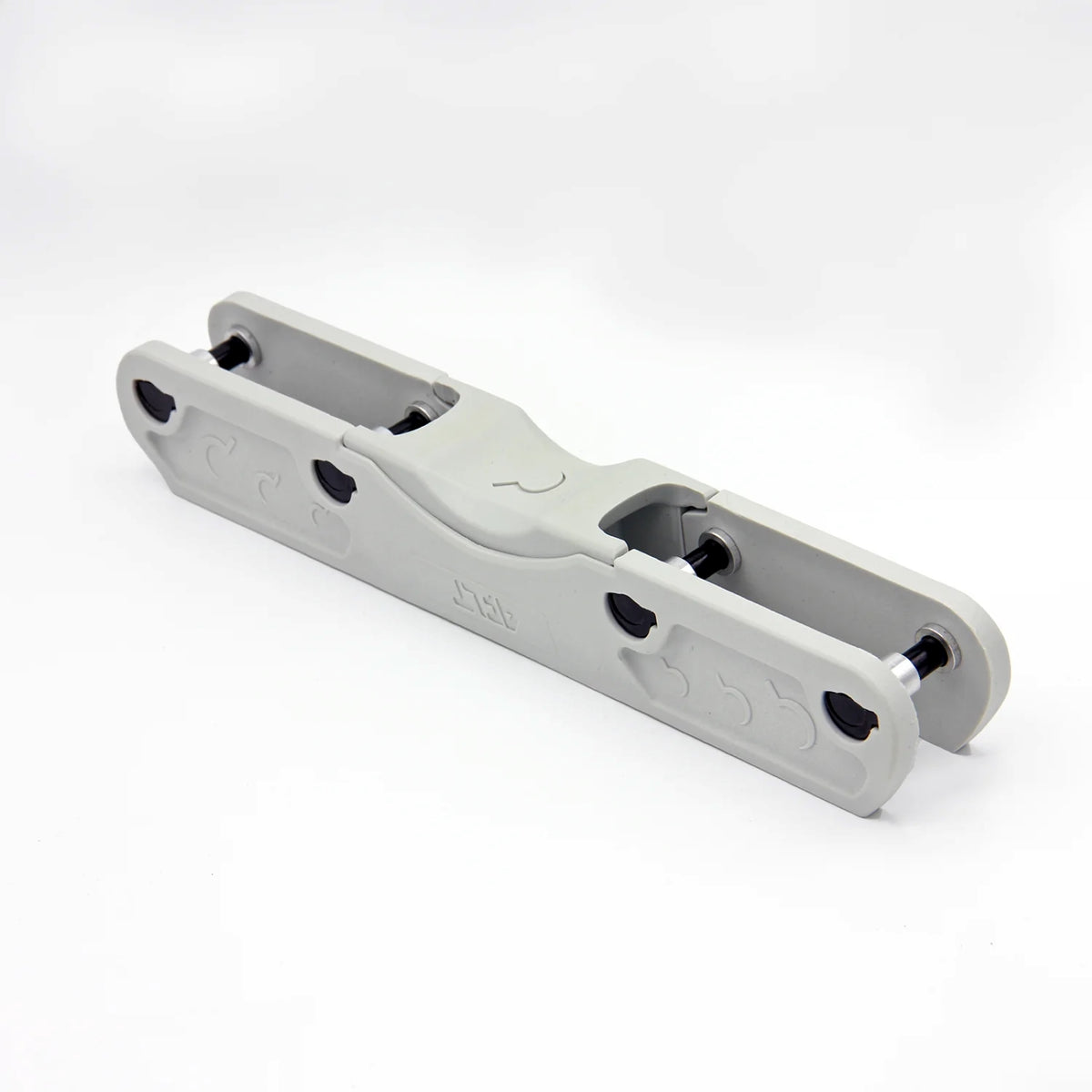 A light grey aggressive inline skate frame with black hardware on a white background.