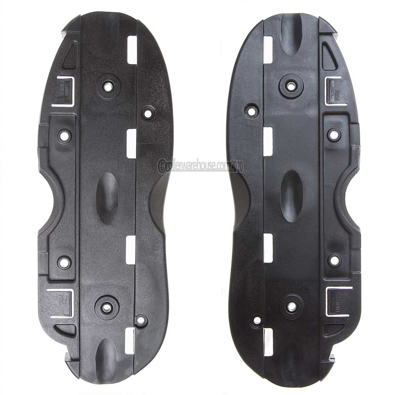 2 plastic black aggressive inline skate sole plate parts featured on a black background