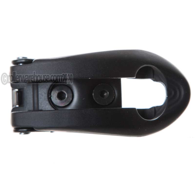 A black metal aggressive skate buckle with a matte finish, featuring a central cutout and two screw holes, shown on a plain white background.