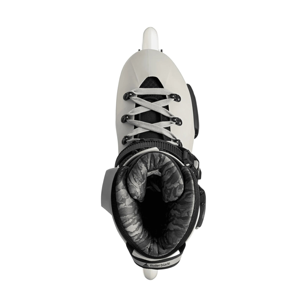 White roller skate with black accents on a white background viewed from the top.