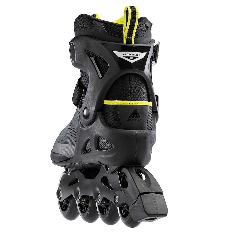 Black and yellow inline skate on a white background