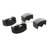 Four black plastic inline aggressive frame inserts on a white background