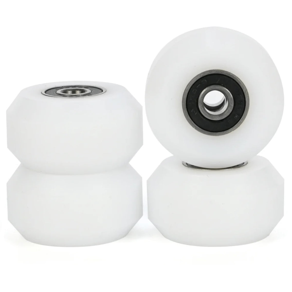 Four aggressive inline skating anti rocker wheels with bearings installed. The wheels are white and the bearings have a black shield with a metal rim on the inner and outer part of the bearing. The background is white.