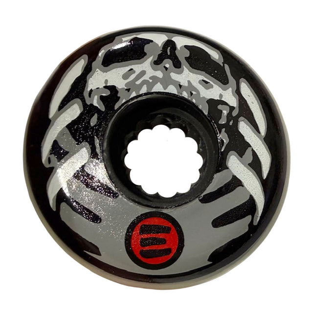 Close up shot of a single aggressive inline skate wheel. The graphic printed on the face of the wheel is of an enlarged skull and rib cage in gray and back. the logo for the company - eulogy wheels - is printed in red. The wheel is featured on a white background.