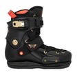 Black boot with gold accents and red details on a white background