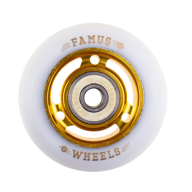 A close up view of a single white urethane aggressive inline skate  wheel with printed gold text that reads "FAMUS 92A 64MM WHEELS" and gold metal core with spokes. The center of the wheel has a white bearing with gold text that reads "FAMUS ABEC 9 WHEELS". The background is white.