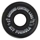 A close up shot of a black skate wheel with white text that reads "GROUND CONTROL LABS 57mm 90A ATF FORMULA" and a white graphic of a planet with a ring. The wheel is featured on a white background.