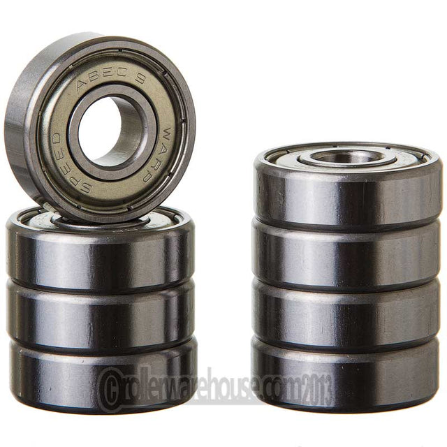 Stacks of metal bearings on a white background