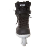 A black inline skate boot with a white base and a white wheel, featuring the brand name 'MESMER' printed in white on the tongue, set against a plain white background.