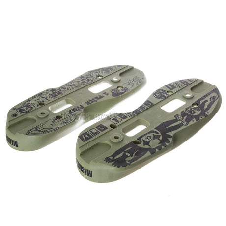 Two green aggressive inline skate parts called soul plates with a black graphic and screw holes milled into them. they are featured on a white background.