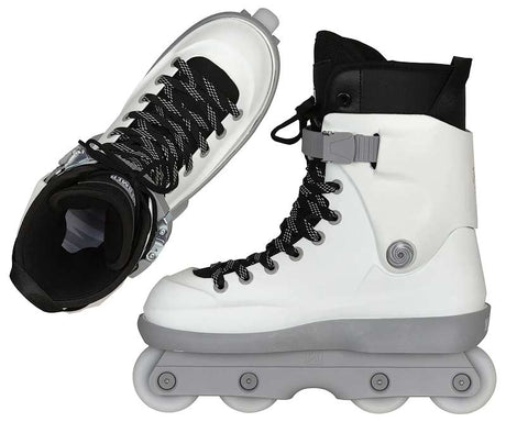 A pair of white inline skates with black laces, black ankle cuffs, and gray wheels and buckle details, shown on a plain white background.