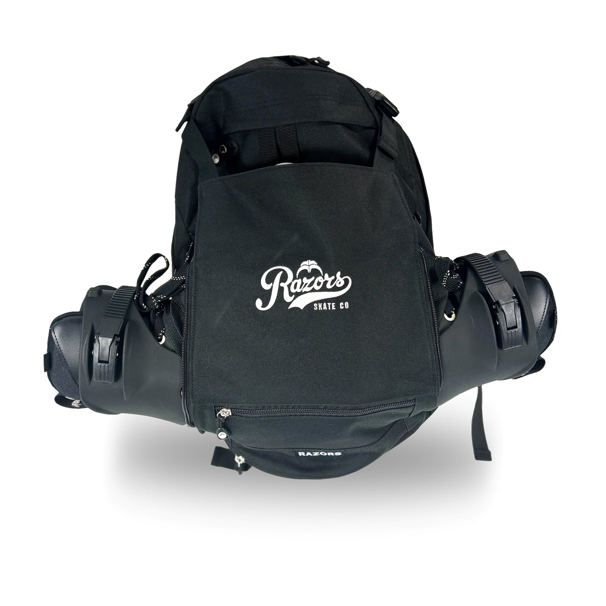 Black canvas backpack carrying two skates with the top of those skates sticking out of both sides of the backpack. The backpack is featured against a white background. 
