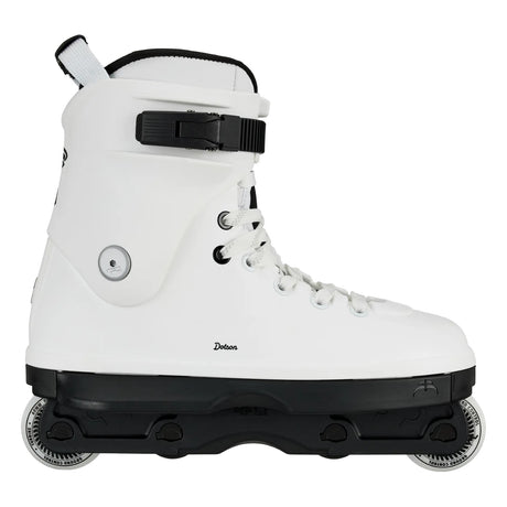 A white inline skate with a black base, black buckle strap, and white wheels, shown from a side profile on a white background.