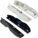 Two plastic replacement trim or housing covers shown on a white background, one in black and one in off-white/cream, each with visible mounting screws.