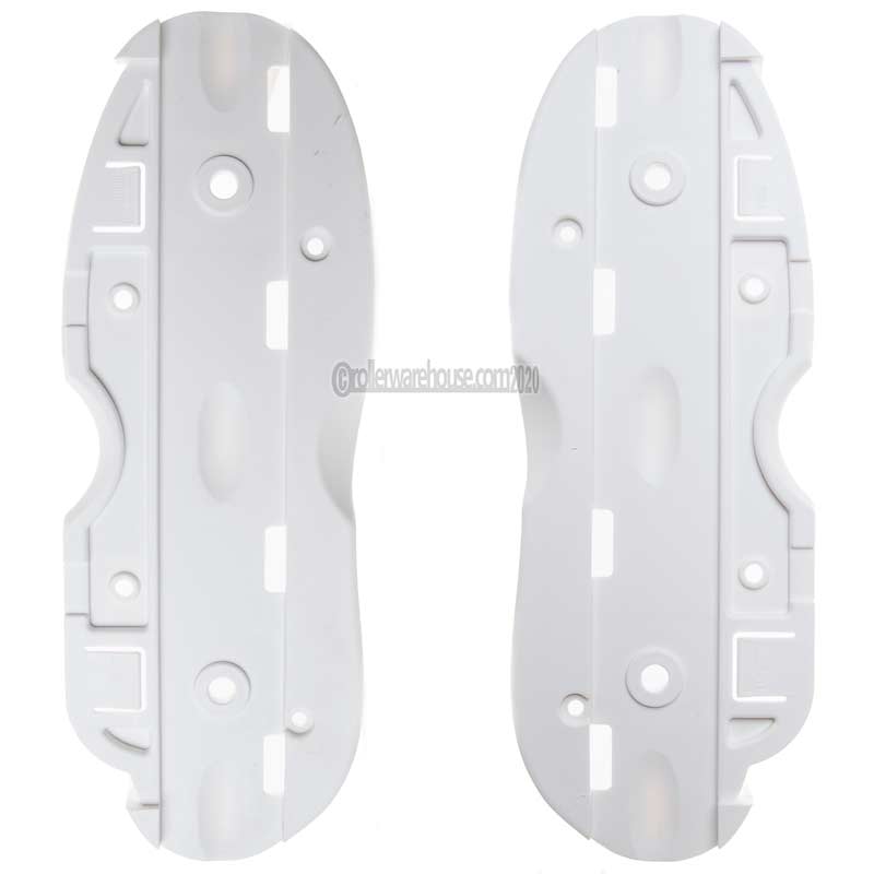 2 plastic white aggressive inline skate sole plate parts featured on a white background