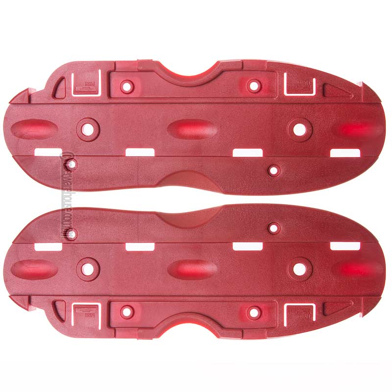 A pair of red molded plastic replacement parts, likely aggressive inline skate soles, shown flat against a white background.