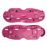 2 plastic pink aggressive inline skate sole plate parts featured on a white background