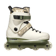 A single inline skate boot shown from the side on a plain white background. The boot is primarily off-white with olive green accents on the base and straps, and a beige-and-black camouflage pattern on the ankle strap and top collar.
