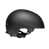 A matte black helmet with ventilation holes and an adjustable black chin strap, shown from a side profile on a solid white background.