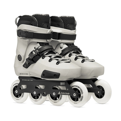 A pair of white Rollerblade skates with black accents and white wheels. The pair of skate are featured against a white background.