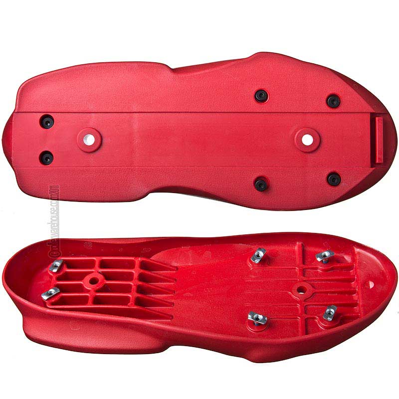 A red plastic aggressive inline skate soul plate part viewed from the top and bottom with screws and ribbing for reinforcement featured on a white back ground.