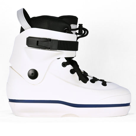 A white Standard skate co inline aggressive skate boot only  with black laces, a black buckle strap, and a navy blue stripe along the sole, shown against a plain white background.