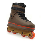 Brown roller skate with orange wheels on a white background